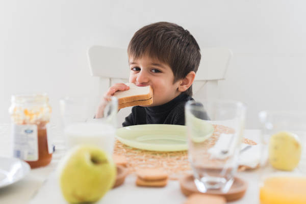 happy-child-eating-sandwich